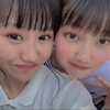 マ