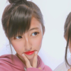 ま